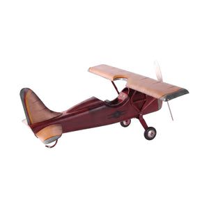Decorative vintage airplane model featuring a red fuselage, wood-toned wings, and a silver propeller.