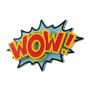 Decorative pop art wall sign featuring the word WOW in bold red and yellow letters on a blue starburst background.