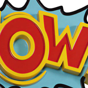 Decorative pop art wall sign featuring the word WOW in bold red and yellow letters on a blue starburst background.