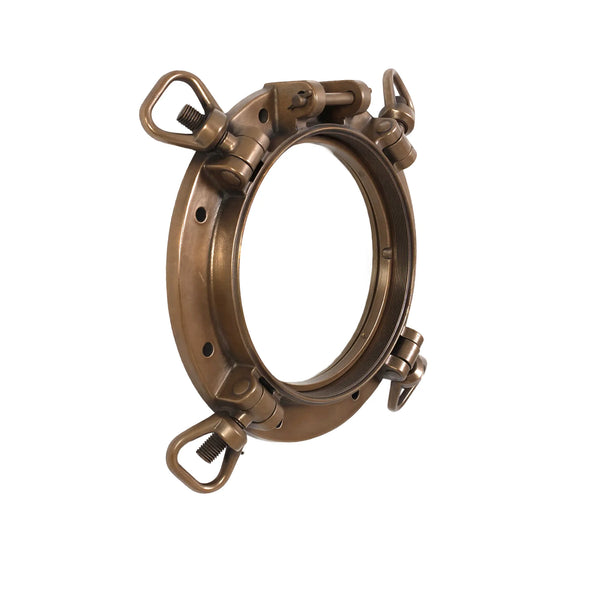 Decorative nautical porthole window featuring a bronze-colored frame and hinged locking bolts.