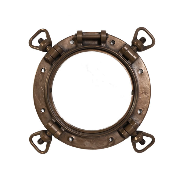 Decorative nautical porthole window featuring a bronze-colored frame and hinged locking bolts.