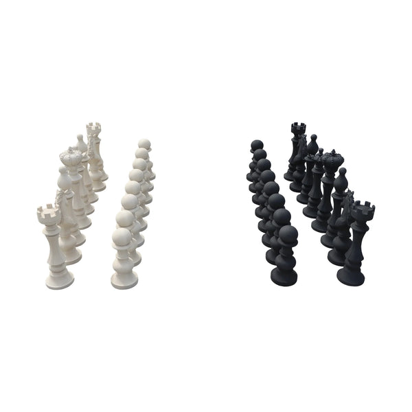 Decorative set of black and white chess pieces featuring traditional shapes like kings, queens, and knights.
