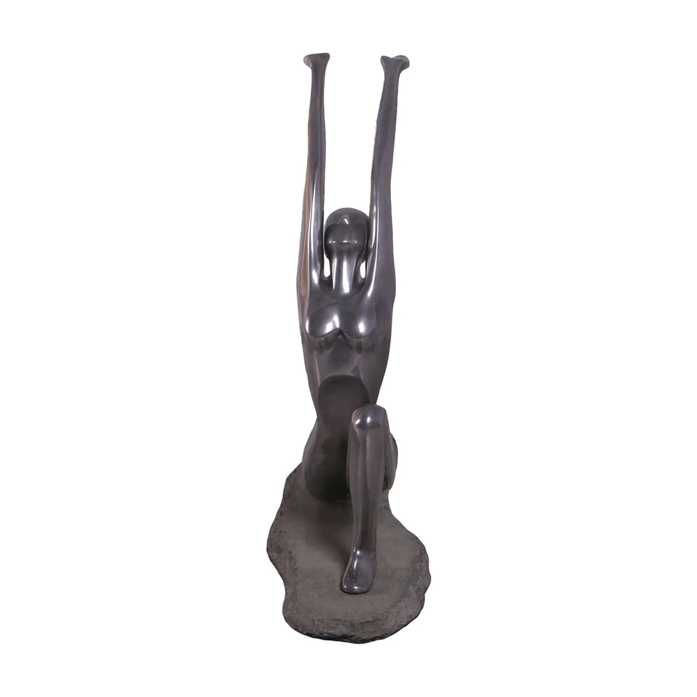 Decorative abstract sculpture of a figure in a yoga lunge pose with a smooth dark finish.