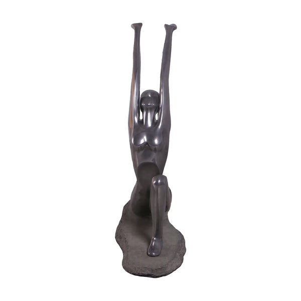 Decorative abstract sculpture of a figure in a yoga lunge pose with a smooth dark finish.