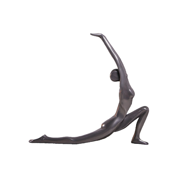 Decorative abstract sculpture of a figure in a yoga lunge pose with a smooth dark finish.