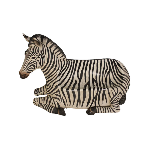 Decorative chair designed to look like a resting zebra with black and white stripes and an integrated seat.