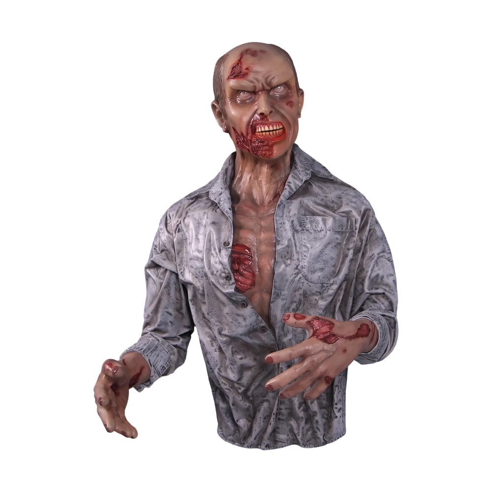Half-body decorative zombie statue with weathered grey shirt, pale skin, and blood details.