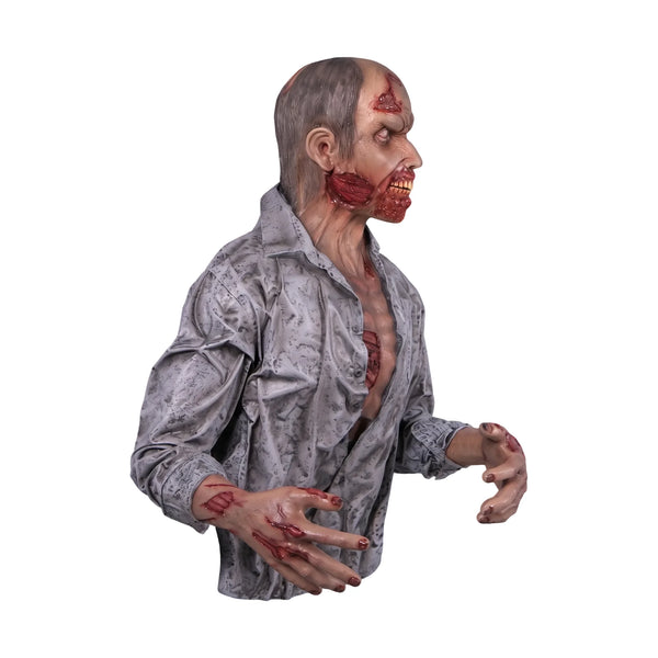 Half-body decorative zombie statue with weathered grey shirt, pale skin, and blood details.